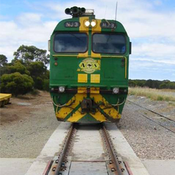 coupled-in-motion rail car weighing 